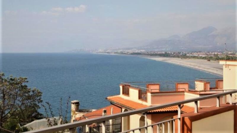 This three-bedroom house in Italy looks out to sea and has private access to a beach.