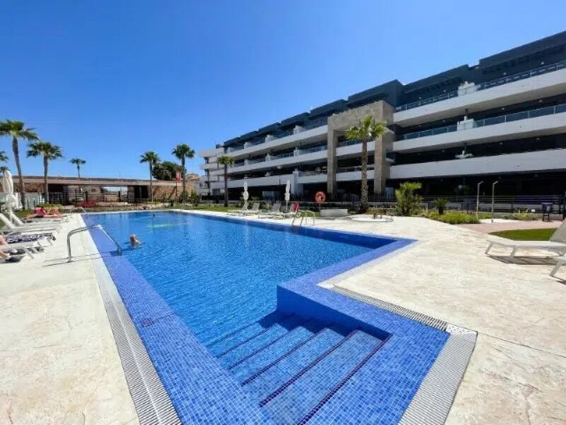 Alicante: Playa Flamenca apartment extends to 103sq m. The large private complex has seven communal swimming pools, two of which are heated.