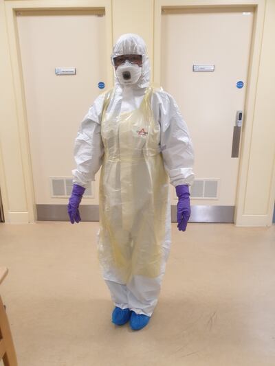 Shella De Los Santos wearing her personal protective equipment