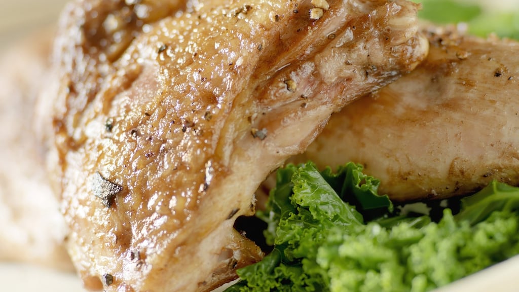 Braised pheasant with curly kale. Photograph: iStock