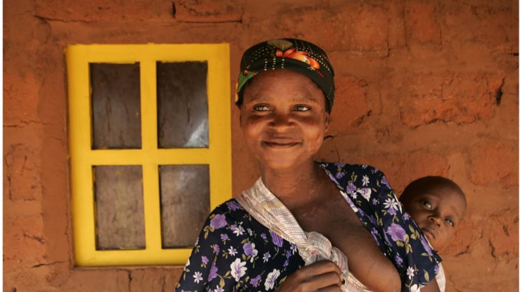 Mother and child at a Concern district development project in Mozambique. Concern is one of the charities that have adopted the Statement of Recommended Practice. Photograph: Dara Mac Dónaill