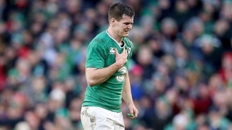 Johnny Sexton leaves the pitch with a chest injury late in the Six Nations game against Wales at the Aviva Stadium. Photograph:  Dan Sheridan/Inpho