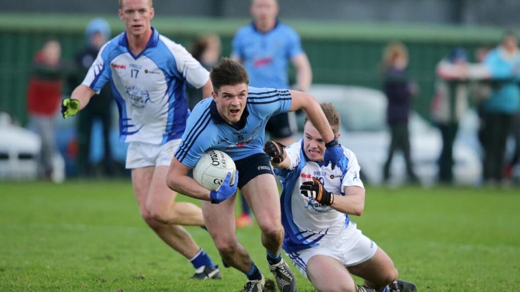 Dublin’s Eric Lowndes gets away from Gavin Burke of Dubs Stars during the annual challenge game at Parnells GAA Club. Photograph: Morgan Treacy/Inpho