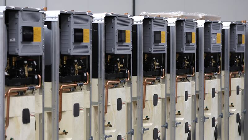 Components of heat pump systems are seen at the Bosch company's production line in Eibelshausen, Germany. Photograph: Ronald Wittek/EPA
