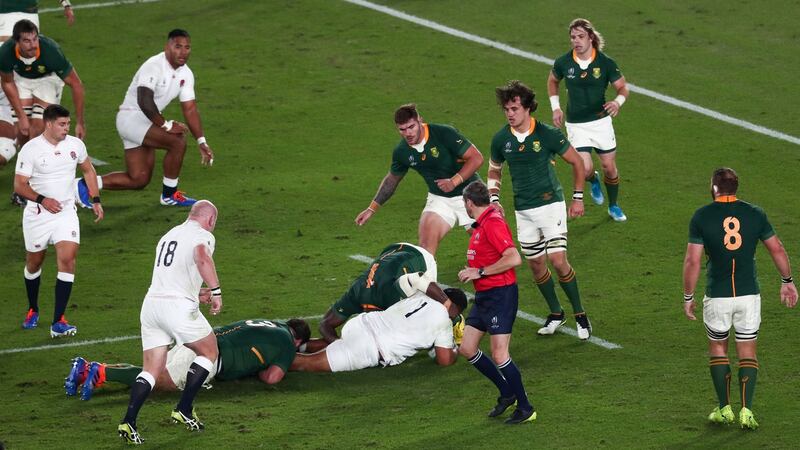 England prop Mako Vunipola is  tackled by South Africa props Frans Malherbe  and  Tendai Mtawarira  during 2019 Rugby World Cup final  in Yokohama. Photograph: Behrouz Mehri/AFP via Getty Images