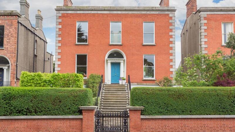 The front of 54 Kenilworth Square in Rathgar is walled, with the advantage of covered side access to the rear from both sides.