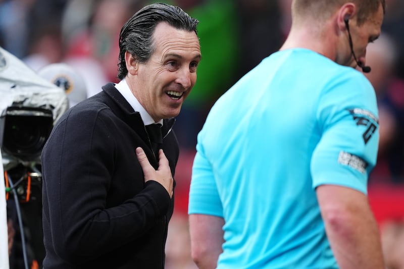 Aston Villa manager Unai Emery speaks to referee Thomas Bramall after Sunday's match at Old Trafford. Photograph: Martin Rickett/PA