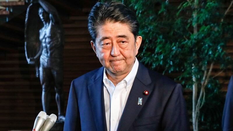 Japanese prime minister Shinzo Abe talks to journalists in Tokyo on Tuesday.  He is likely to use the latest launch to argue for the need to rewrite Japan’s pacifist constitution. Photograph: Kimimasa Mayama/EPA