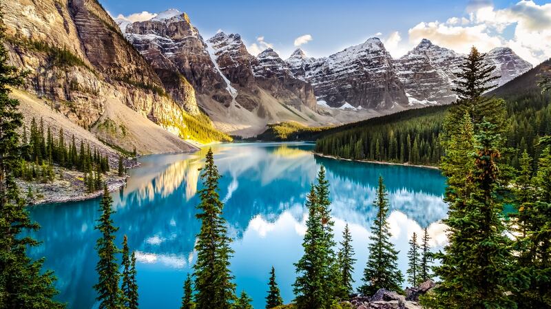 Landscape sunset view of Morain lake and mountain range, Alberta, Canada