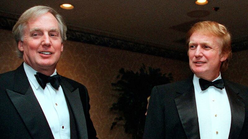 Robert Trump joins then real estate developer Donald Trump at an event in New Yorkin November 1999. Photograph: Diane Bonadreff/AP