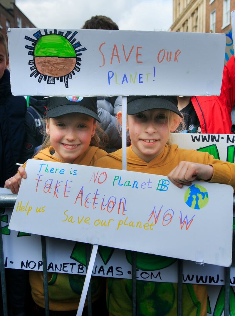 Isabella Lee-Miller (10) and Ruby Jo Cowdell (10) from Naas, Co Kildare during a protest for action to tackle climate change by schoolchildren at Leinster House, Dublin. File photograph: Gareth Chaney Collins