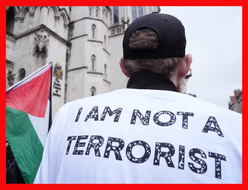 A campaigner outside the high hourt in London on Friday. Photograph: Jonathan Brady/PA Wire