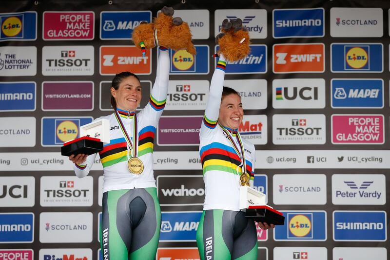 Katie George Dunlevy and Linda Kelly celebrate with their gold medals on the podium. Photograph: SWpix/Inpho