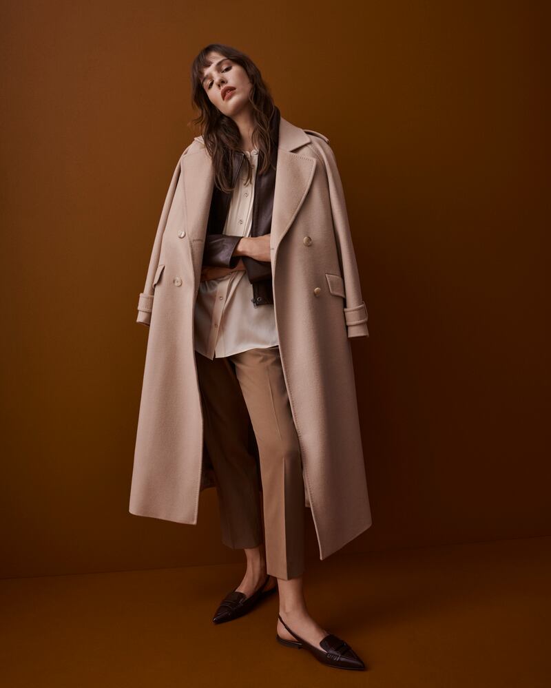Stone wool Coat, €469, brown leather jacket, €389, cream shirt, €149, caramel trousers, €149, all from Jaeger; shoes, €65, from Marks & Spencer