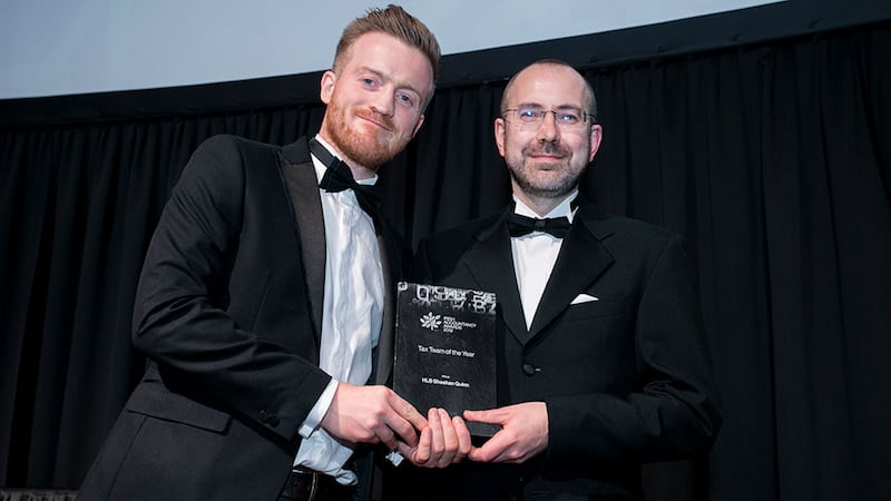 Fergal McManus, Regional Account Manager – Ireland, Confirmation, presents the Tax Team of the Year award to Bruce Stanley, HLB Sheehan Quinn.