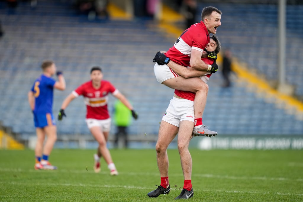 Conor Geaney and Tom O'Sullivan celebrate Dingle's victory against St Finbarr's in the Munster Club Senior Football Championship final at Semple Stadium, Thurles. Photograph: James Lawlor/Inpho