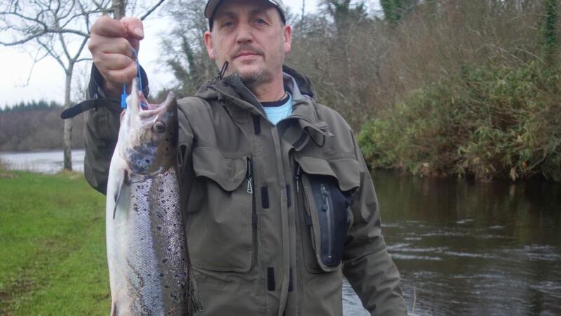 Ballybofey angler Eddie Roulston with the first fresh salmon of 2016 from the river Drowes. The fish weighed 3.5kg and was caught with a Red Flying C lure.