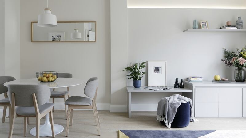 Choose a unifying base when it comes to flooring, and complimentary colours on the walls throughout