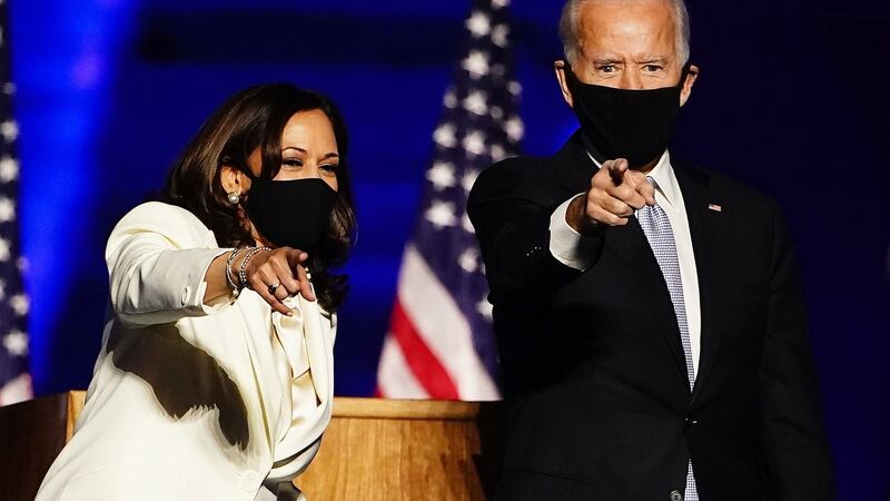 Kamala Harris and president-elect Joe Biden on stage in    Delaware. Photograph: Jim Lo Scalzo/EPA