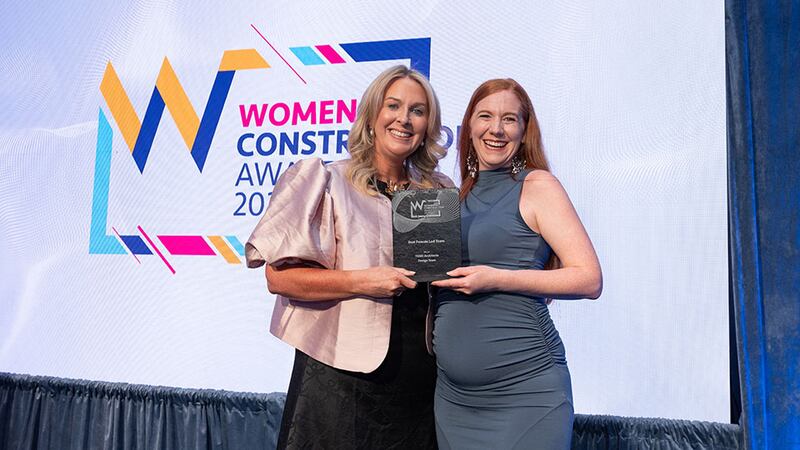Emma Maye, awards judge, presents the best female led team award to Aisling Walker, TODD Architects