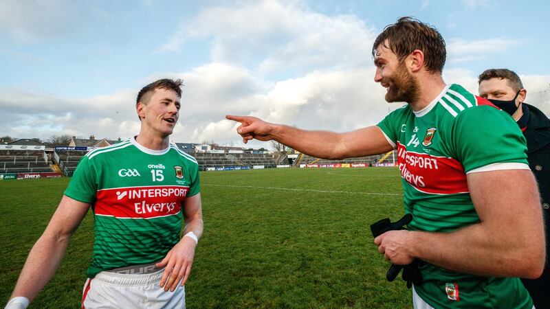 Cillian O’Connor and Aidan O’Shea celebrate Mayo’s win in the Connacht SFC final against Galway at Pearse Stadium in Salthill. Photograph: James Crombie/Inpho
