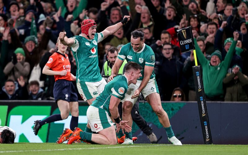 Dan Sheehan celebrates scoring Ireland’s fourth try with James Lowe and Josh van der Flier. Photograph: Dan Sheridan/Inpho