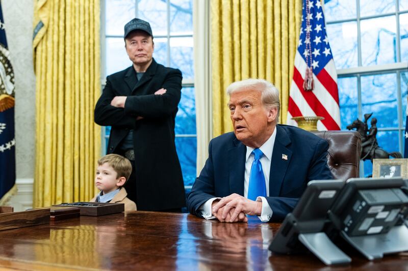 Elon Musk with his son and US president Donald Trump in the Oval Office in February. Photograph: Eric Lee/The New York Times 