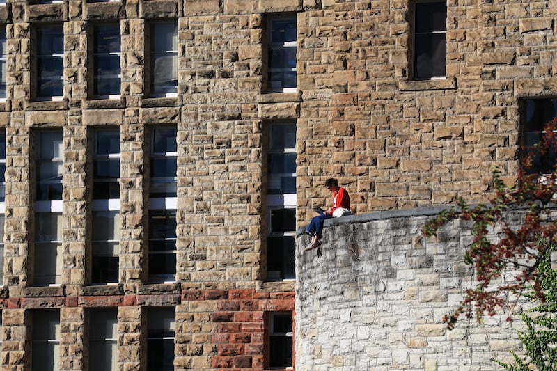 A student sits on campus at Cornell University in New York. Photogarph: Spencer Platt/Getty Images