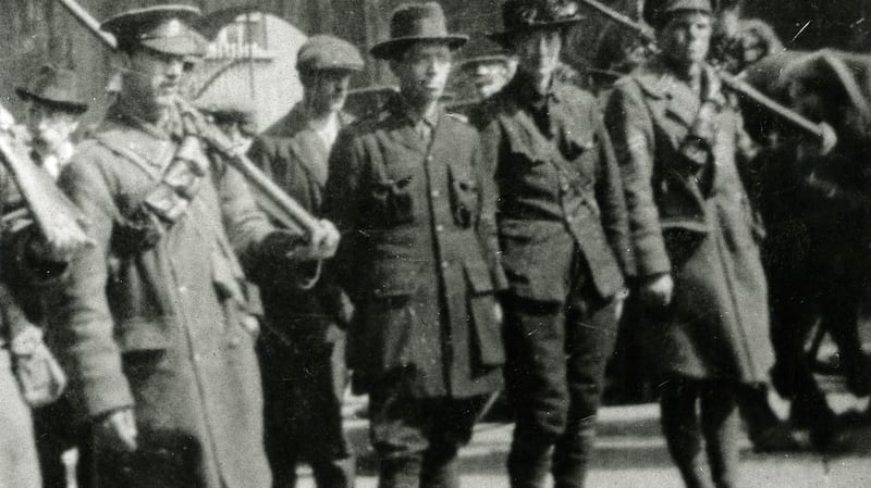 Michael Mallin and Countess Markievicz being escorted away by government troops, Easter rising 1916.  Photograph: Courtesy of National Museum of Ireland