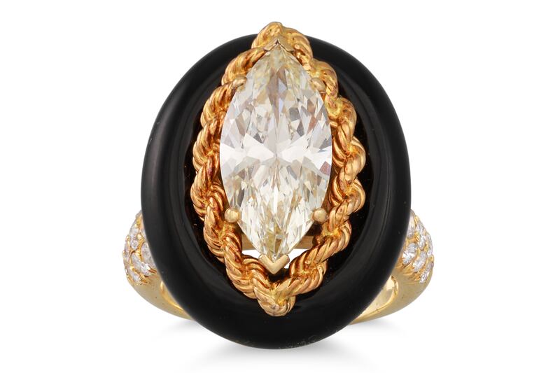 A vintage diamond and black enamel ring by British jeweller David Morris