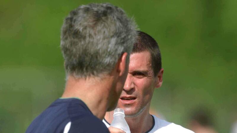 Roy Keane chats to  Mick McCarthy during squad training at the Adagym sportsgrounds in  Saipan on May 20th, 2002. Photograph: David Maher/Sportsfile
