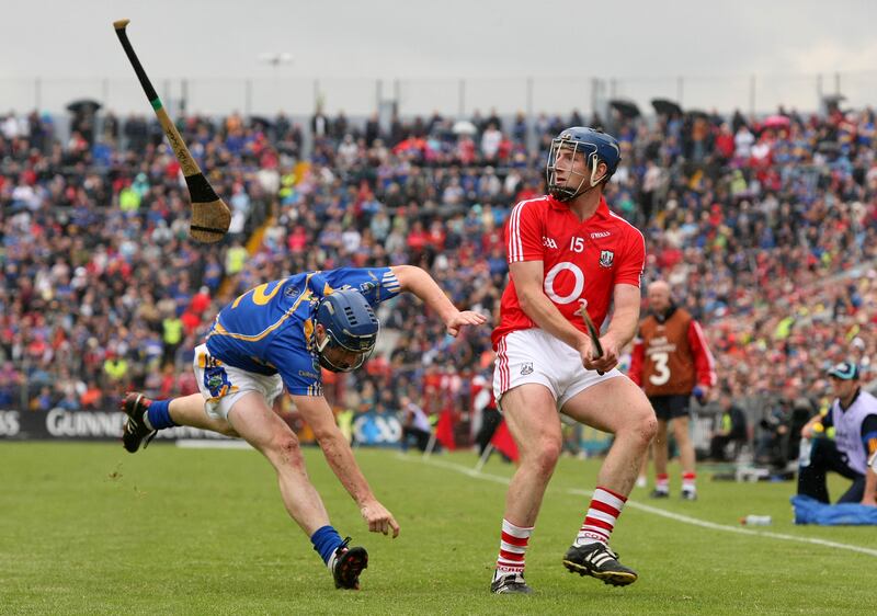 Patrick Horgan in action against Tipperary's Paddy Stapleton during the 2010 Munster quarter-final. Photograph: Cathal Noonan/Inpho