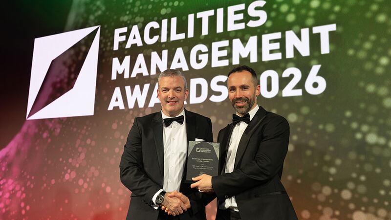 David Norton, key account manager, Tork, presents the excellence in sustainability – service provider award to Eddie O'Sullivan, MCR Group
