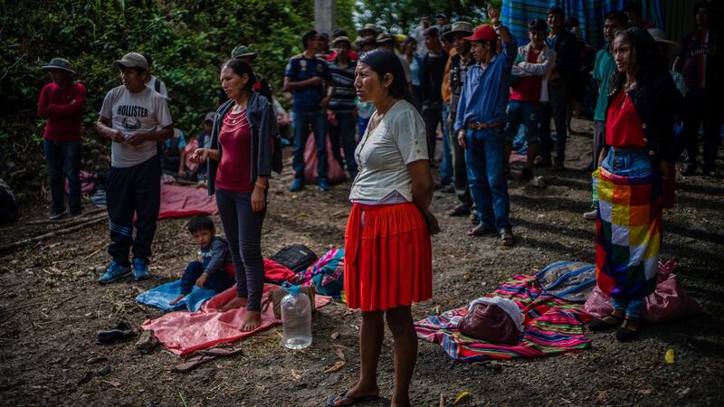 Blocking the  road from Cochabamba to Santa Cruz in Bolivia.  Thousands of people have camped  on strategic roadways in Bolivia demanding the  return of former president Evo Morales. Photograph: Federico Rios/The New York Times