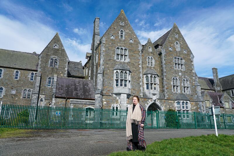 Catherine Coffey O'Brien at the former St Finan's hospital in Killarney, where her mother and six uncles were 'incarcerated'.  Photograph: Enda O'Dowd