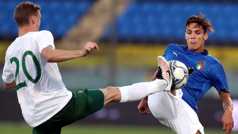 Samuele Ricci  of Italy in action against Ireland’s  Jack Taylor during the game in Pisa. Photograph: Gabriele Maltinti/Getty Images
