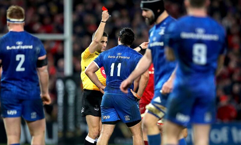Leinster’s James Lowe is shown a red card against Munster. Photograph: Ryan Byrne/Inpho