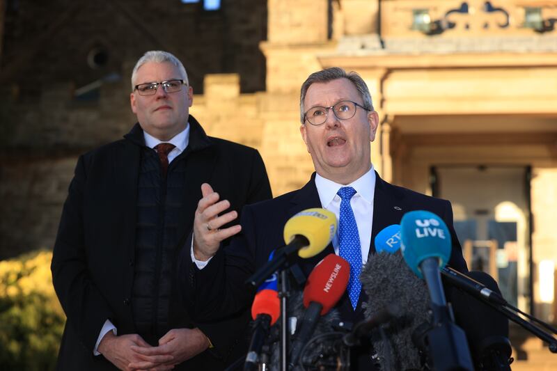 DUP leader  Jeffrey Donaldson  (right) and party colleague Gavin Robinson  speak to the media at Stormont. Powersharing in Northern Ireland is set to return after the DUP party executive backed a UK government deal aimed at addressing its concerns over post-Brexit trade barriers. Photograph: Liam McBurney/PA 