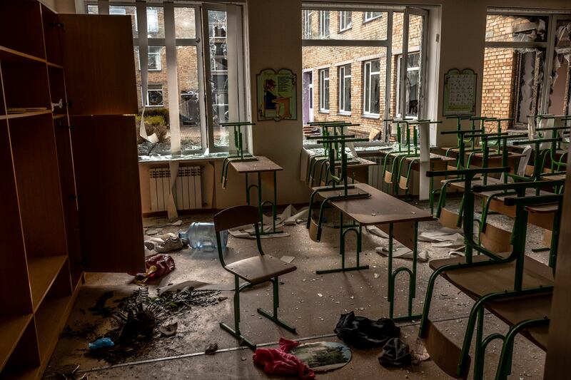 A classroom ransacked by Russian soldiers at School No. 3 in Bucha, Ukraine, last year.  Photograph: Daniel Berehulak/The New York Times
                      