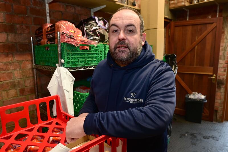 Paul McCusker sorts provisions at The People's Kitchen. Photograph: Arthur Allison/Pacemaker Press

