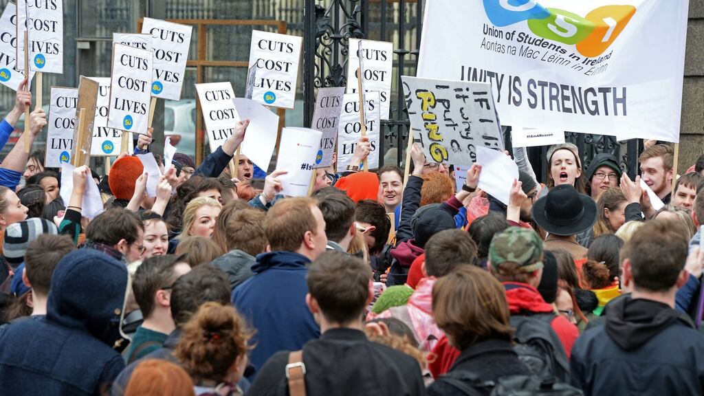 People protest against the diversion of €12m from the State’s mental health budget, outside Leinster House, Dublin. Photograph: Eric Luke/The Irish Times