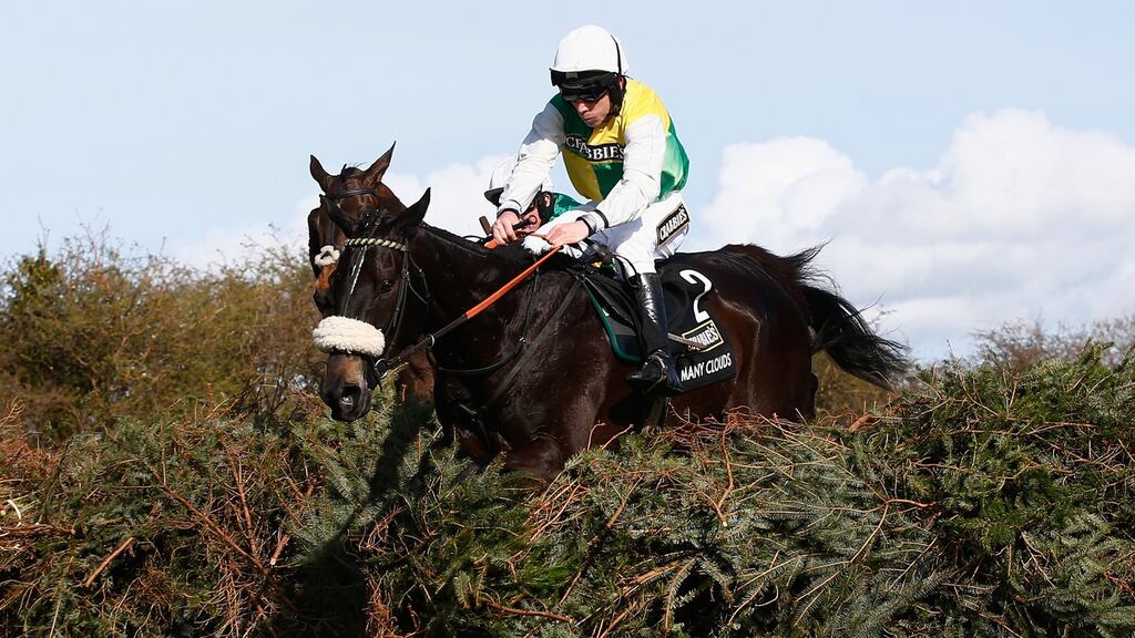 Many Clouds and Leighton Aspell on the way to winning the 2015 Crabbie’s Grand National at Aintree. Photograph: Clive Rose/Getty Images