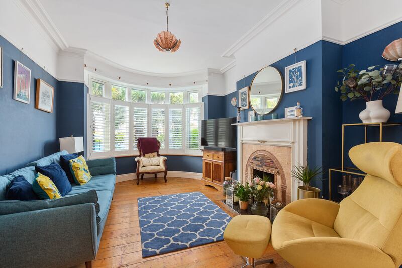 Livingroom, with feature fireplace and hardwood flooring