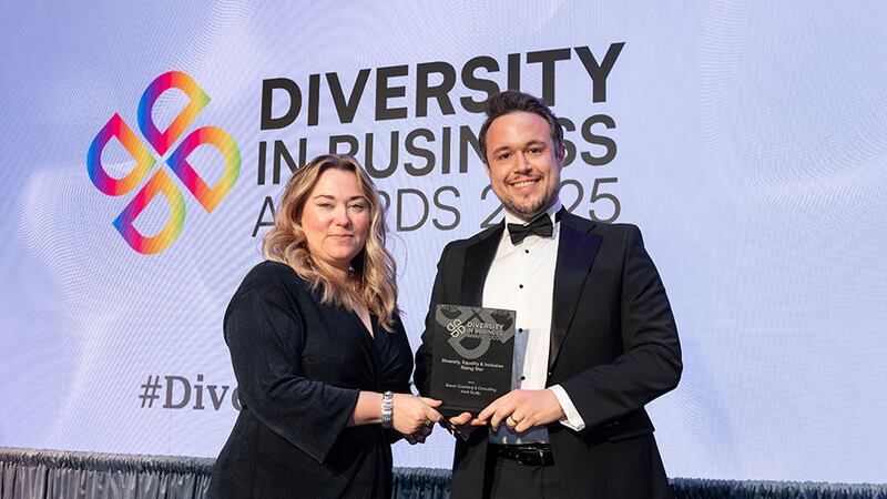 Sile Walsh, awards judging coordinator, presents the diversity, equality & inclusion rising star award to Mark Scully, Braver Coaching & Consulting