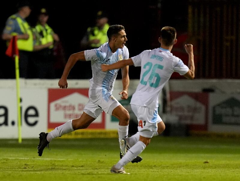 Rijeka's Ante Orec (left) celebrates with Tiago Dantas after scoring his sides third goal against Shelbourne at Olka Park. Photograph: Niall Carson/PA Wire
