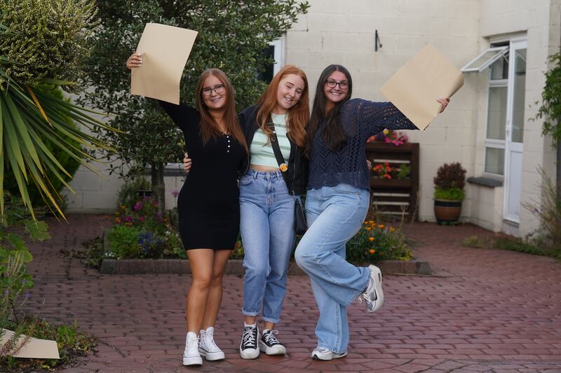 Sophie Brohoon, Rebecca Kavanagh and Nimh Woods, students at Donahies Community School, Dublin, after receiving their Leaving Certificate results. Photograph: Brian Lawless/PA Wire 