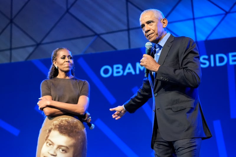 Barack Obama and Michelle Obama speak at the Obama Presidential Center at an event a few days before the grand opening. Photograph: Pablo Martinez Monsivais/AFP/Getty