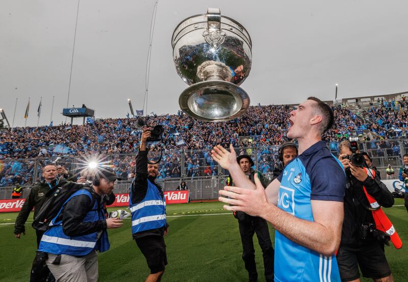Dublin’s Brian Fenton celebrates with the Sam Maguire after his team's All-Ireland final win over Kerry. Photograph: James Crombie/Inpho