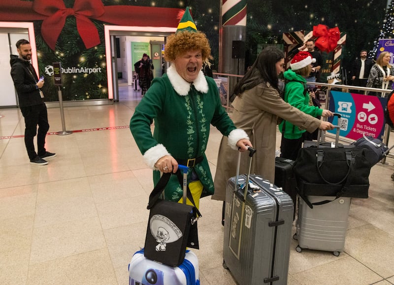 'Alan the Elf' pictured at Dublin Airport's Terminal 2 as more than one million passengers travel through the airport on their way home for Christmas. Photograph: Colin Keegan/Collins, Dublin