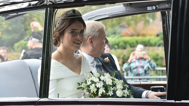 Princess Eugenie rides in a car  on her way to marry Jack Brooksbank.  Photograph: PA